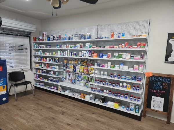 Over-the-counter medication shelves inside Redding Drug pharmacy